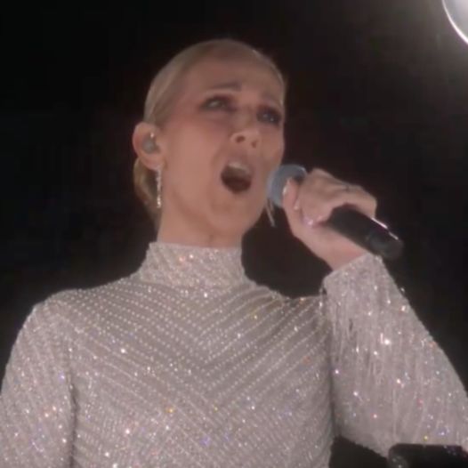 Celine Dion Performs Atop The Eiffel Tower During The 2024 Paris